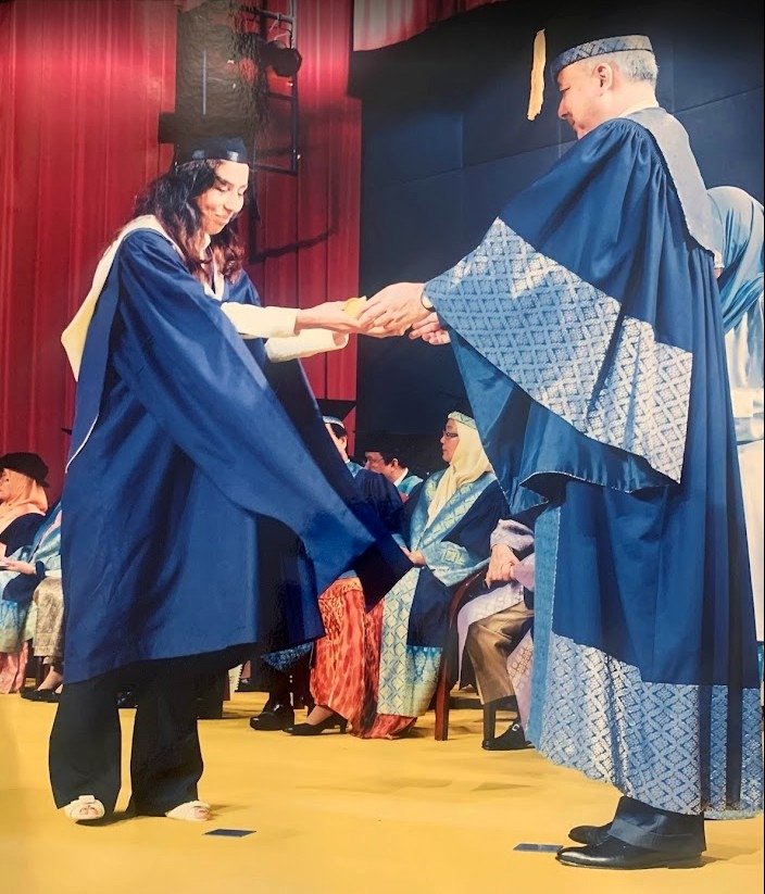 Melica Mahmoudi receiving her university degree